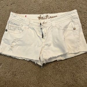 Wallflower low rise, distressed white jean shorts